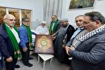 伊朗《古兰经》书法家为胡赛尼陵园捐赠手稿《古兰经》+ 照片